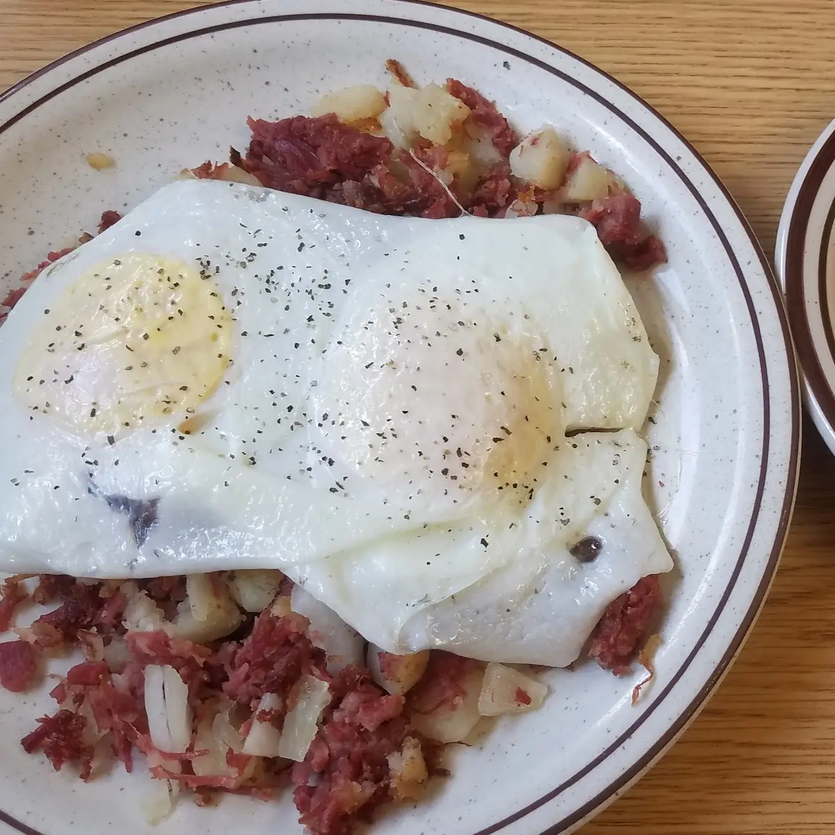 Corn Beef Hash and Eggs with a Biscuit