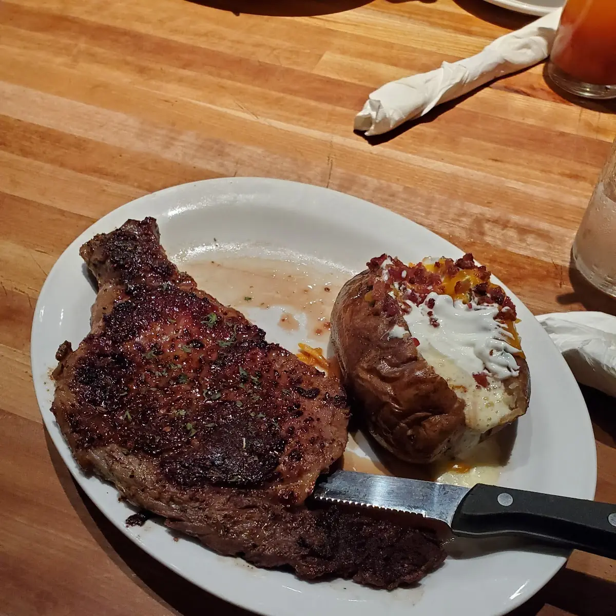Ribeye Steak with Mashed Potatoes and Baked Potato