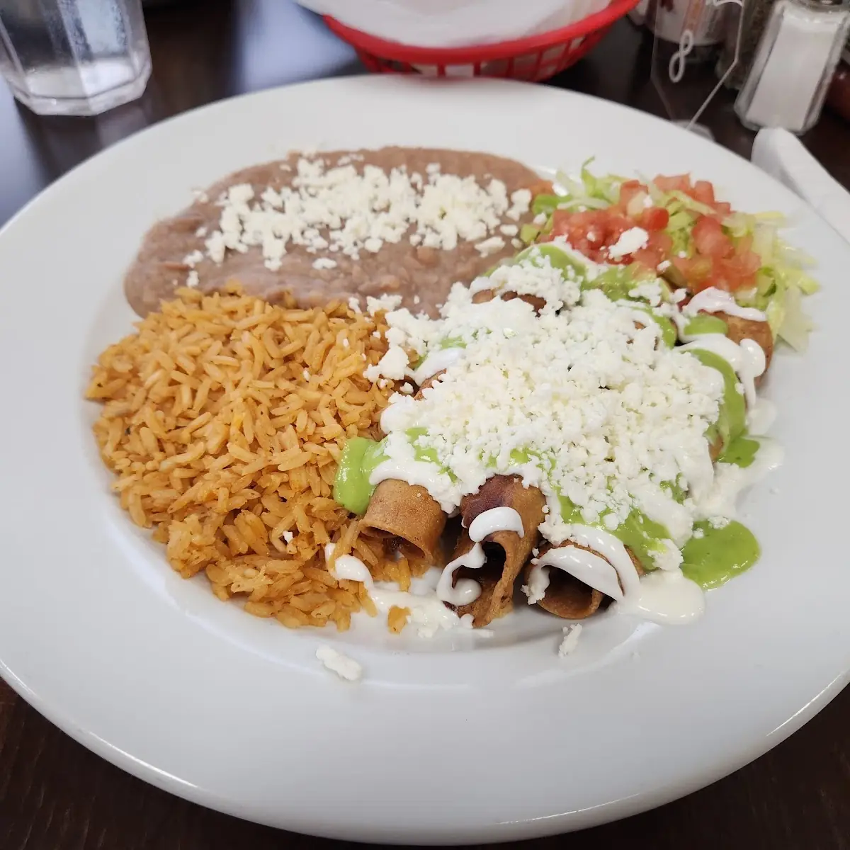 Chicken Taquitos Plate with Queso Fresco