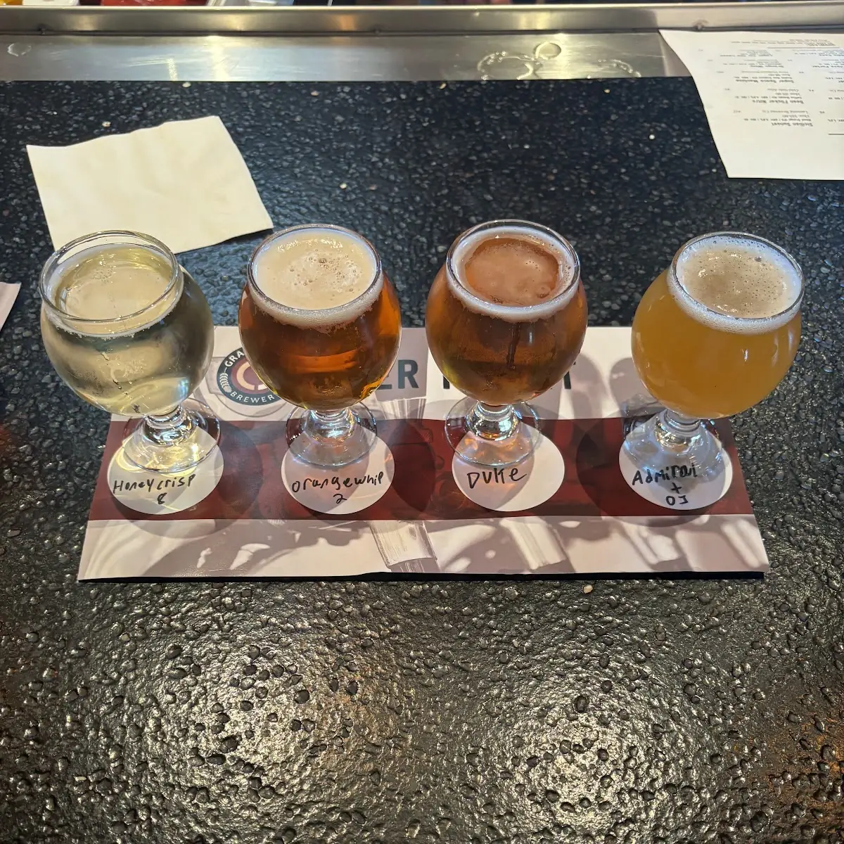 Craft Beer Flight on Wooden Table