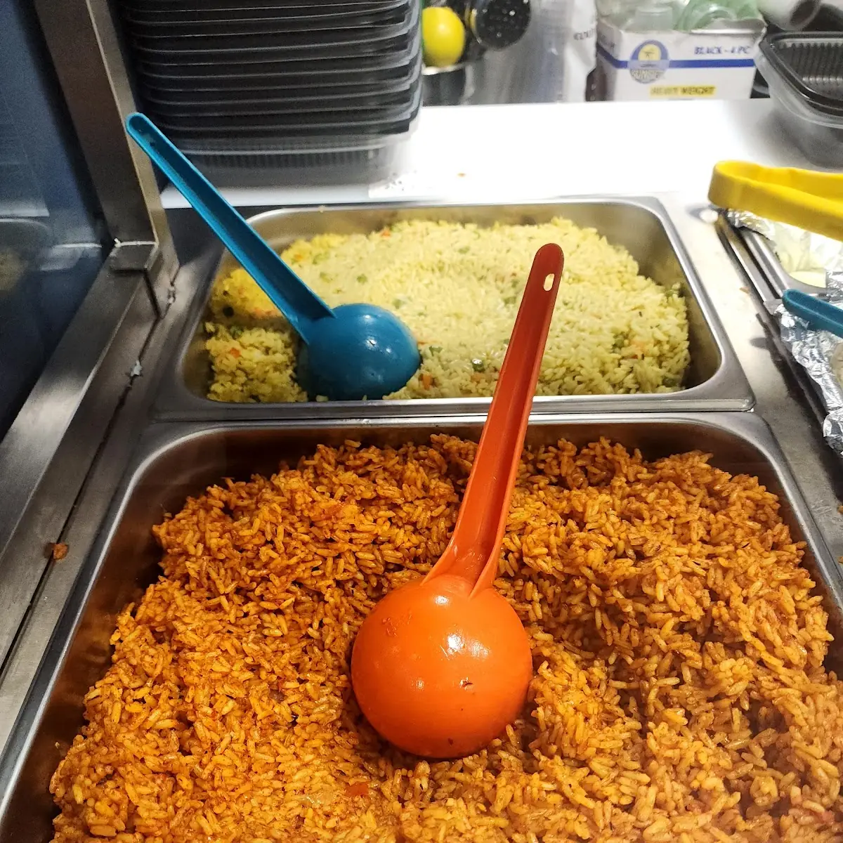 Back- Fried Rice Front- Jollof Rice