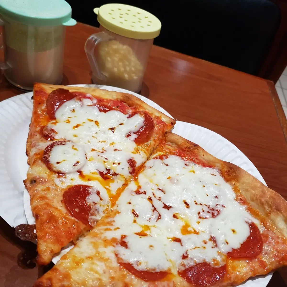 Extra Cheese and Pepperoni Pizza Slices