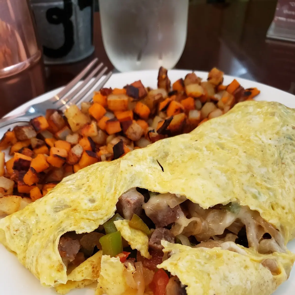 Sausage Cheese and Vegetable Omelette with Hash Browns