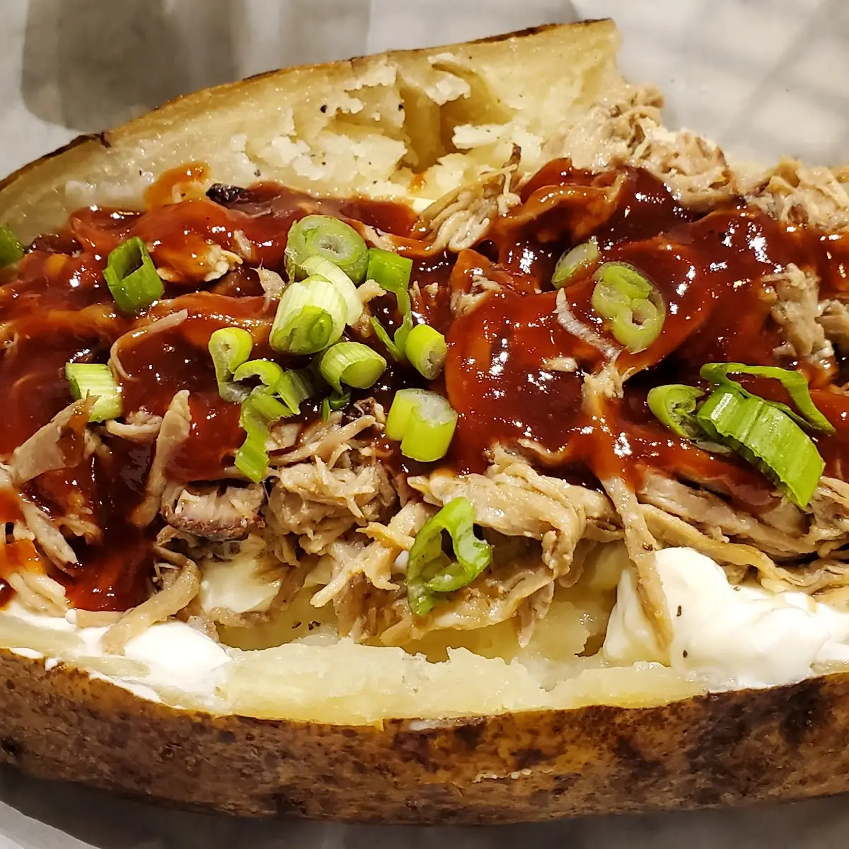 Smoked BBQ Pulled Pork Baked Potato