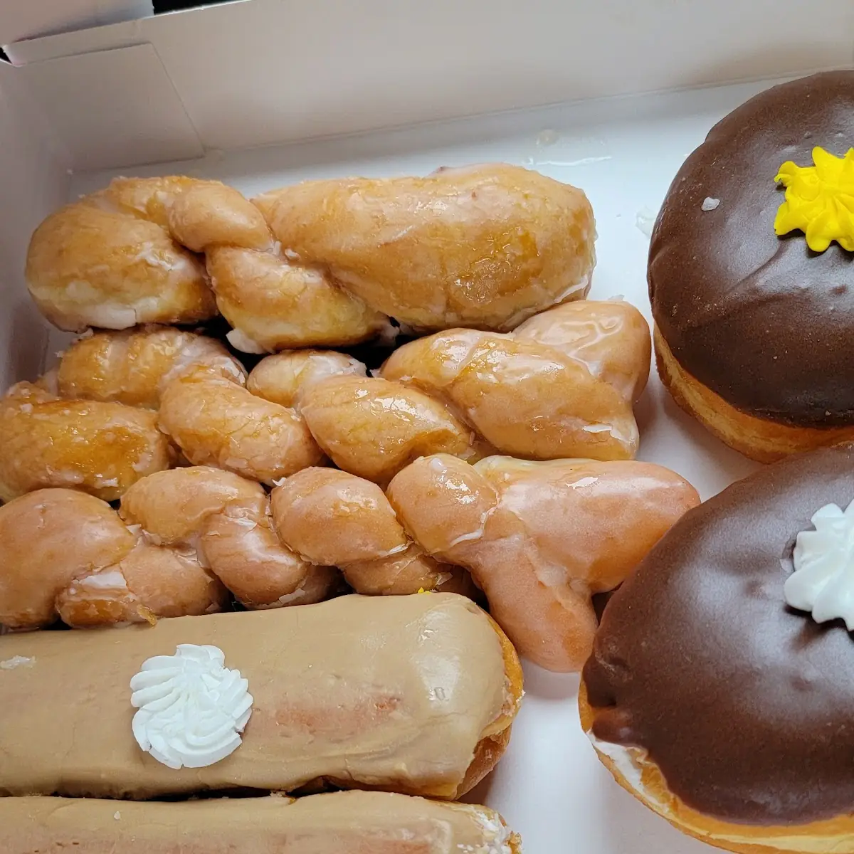 Glazed Donuts Creme Donuts Custard Donuts and Maple Cream Filled Long John