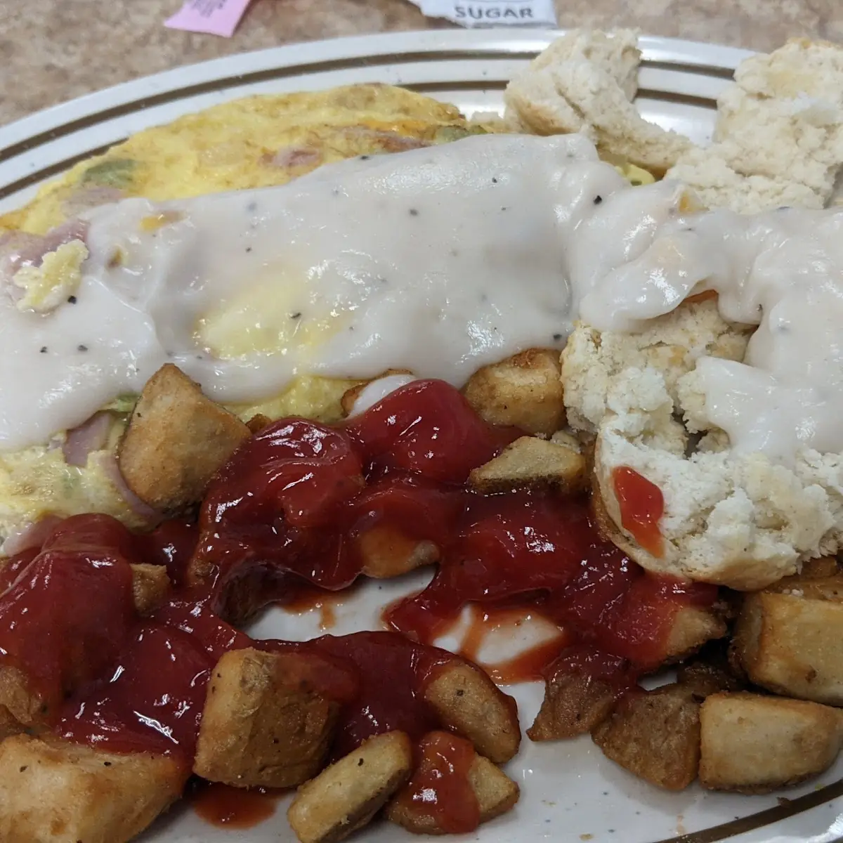 Western Omelet with Biscuits Hash Browns and Gravy