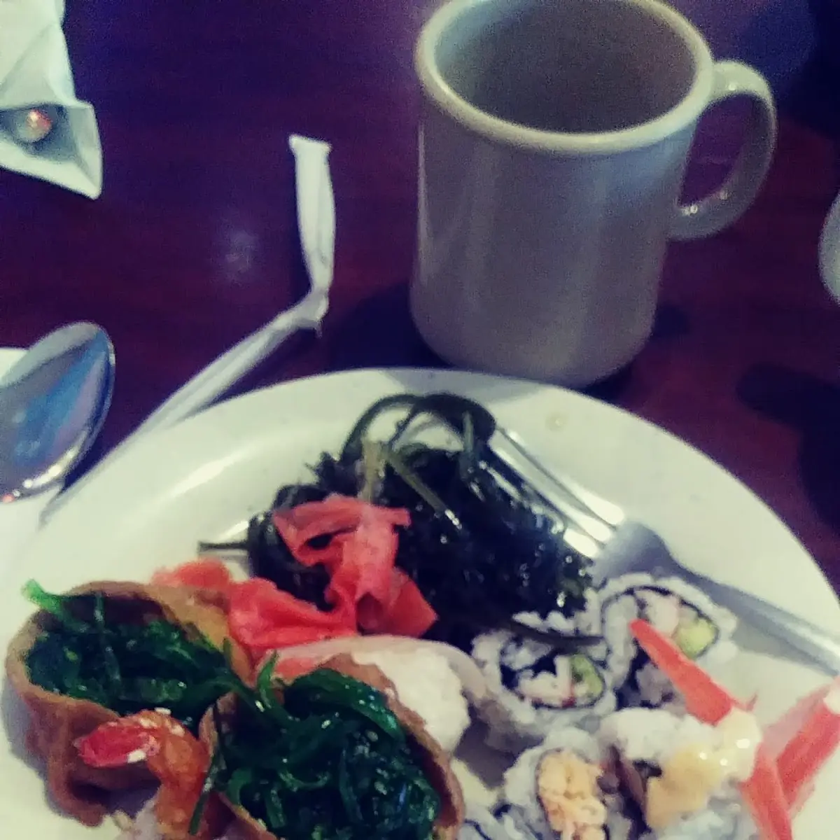 Assorted Sushi with Pickled Ginger Wasabi Paste and Seaweeds