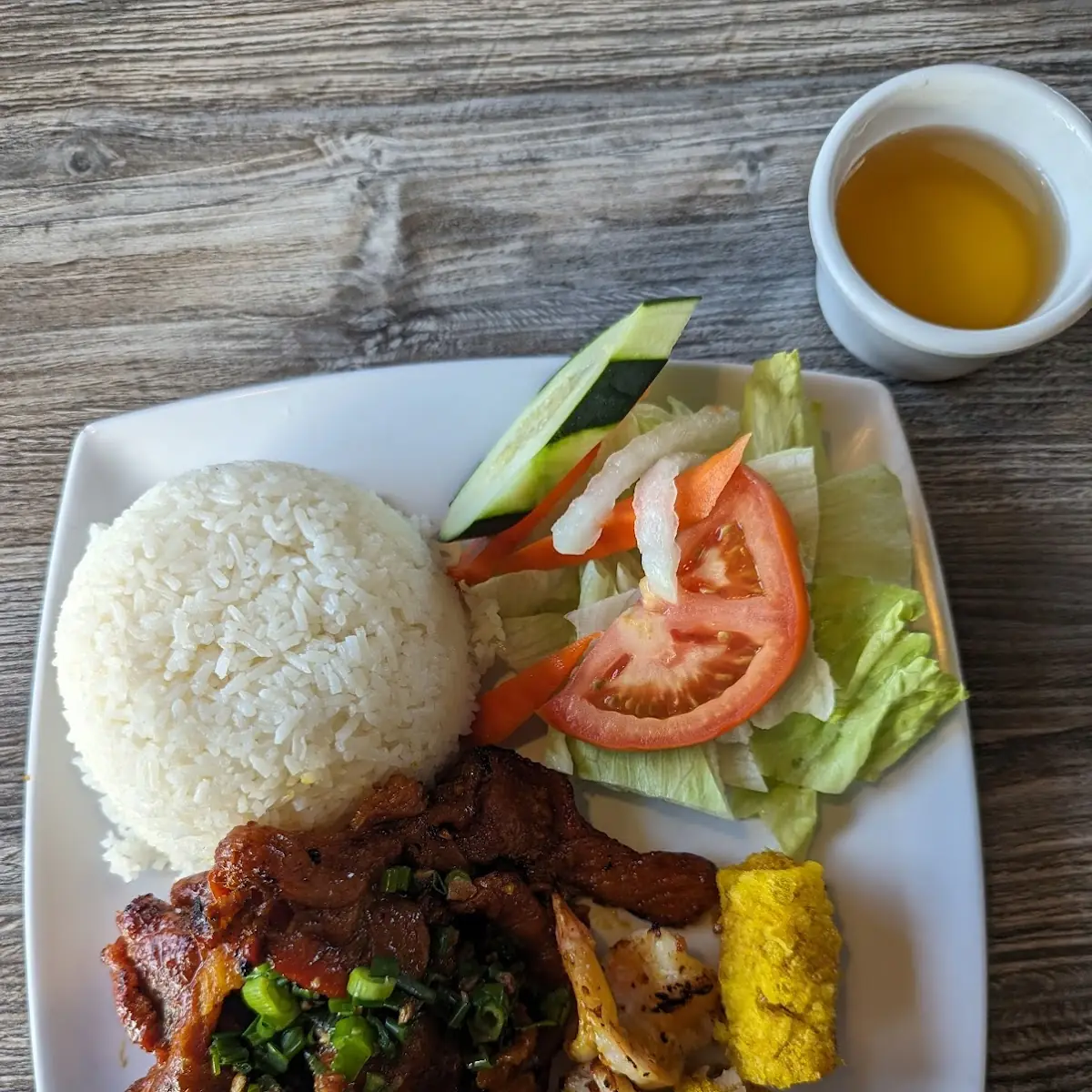 38 Marinated Shrimp Grilled Pork Egg Roll over Rice