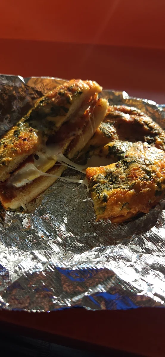Bacon Egg and Cheese on a Pepperjack Spinach Bagel