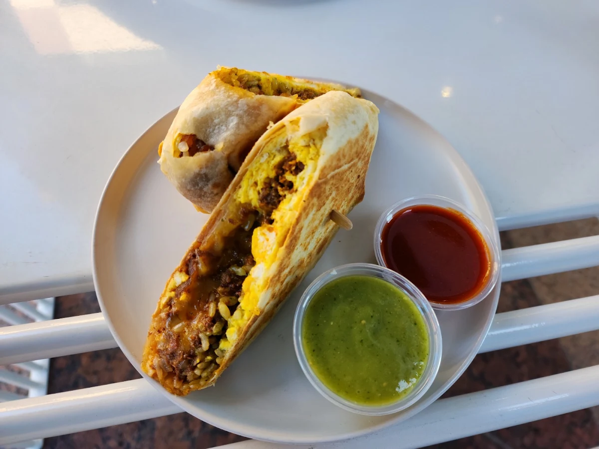 Chorizo Breakfast Burrito with Scrambled Egg Cilantro Rice Hash Brown Cheddar Jack & Grilled Onion