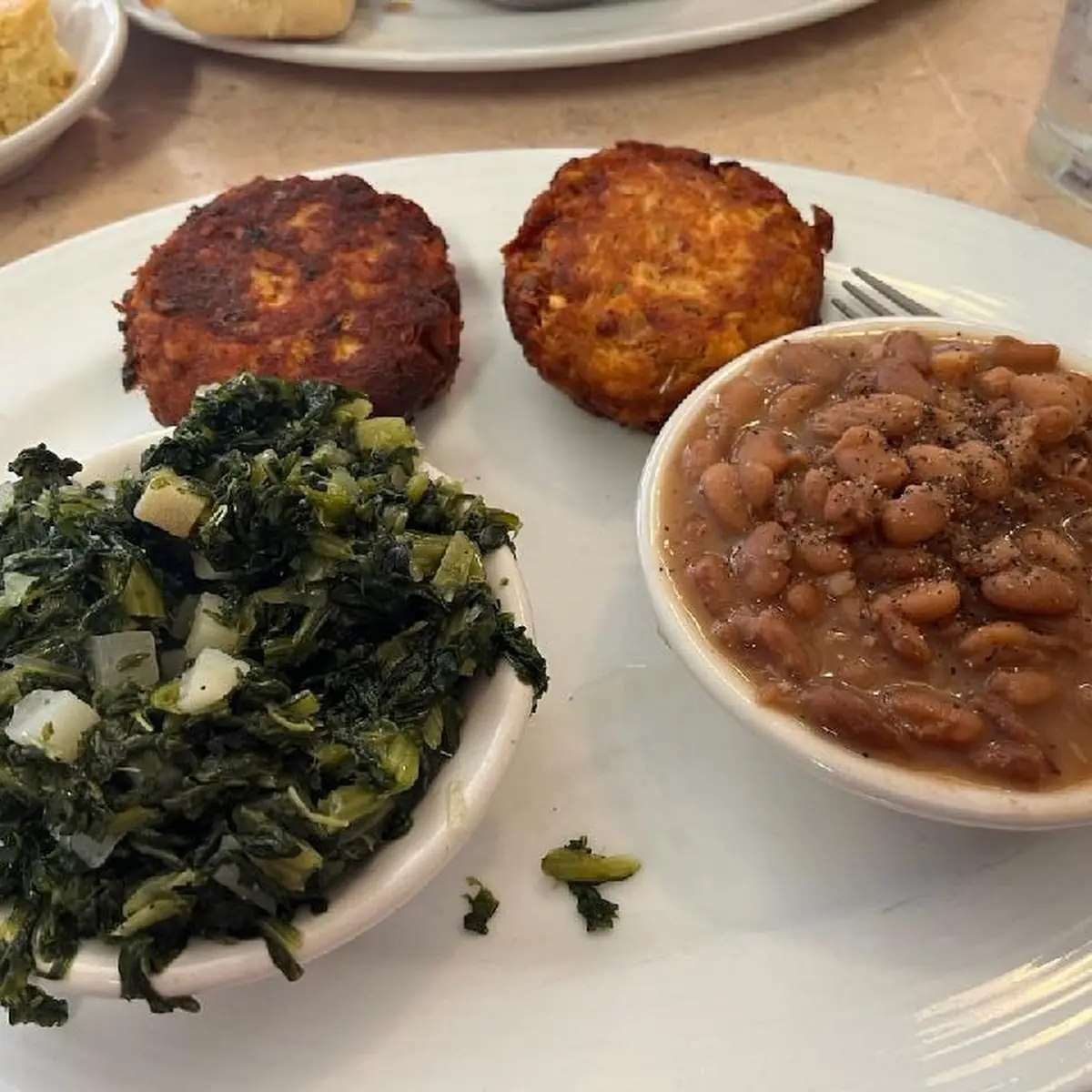 Salmon Cakes Greens and Pinto Beans