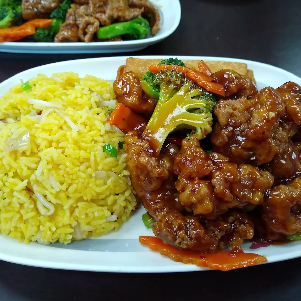 General TSO's Chicken with Pork Fried Rice and an Egg Roll