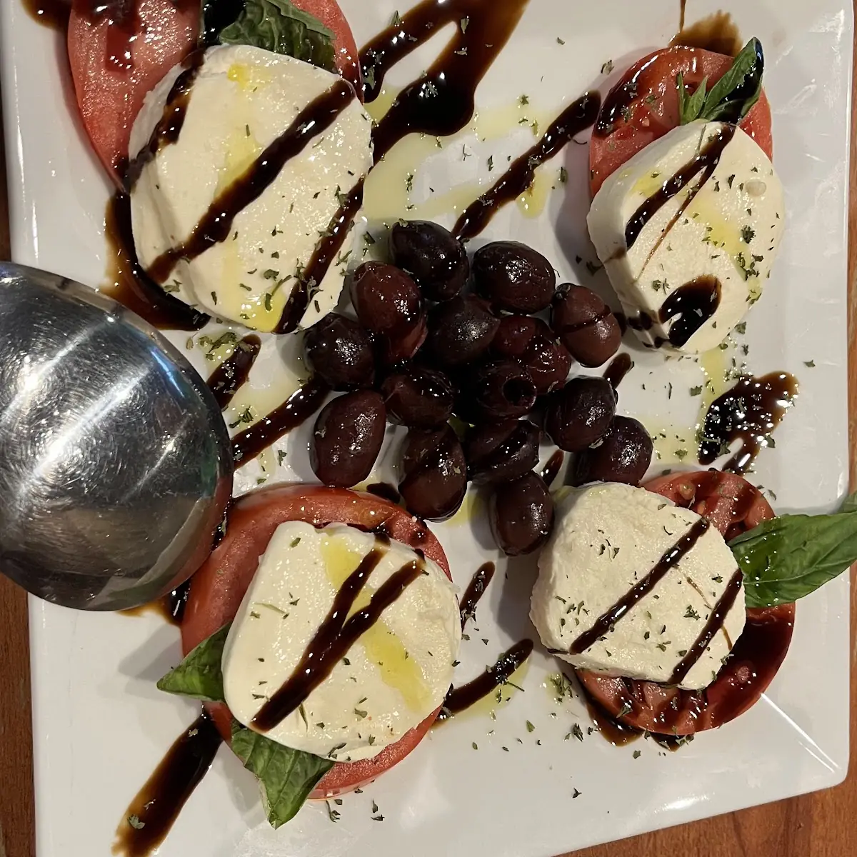 Mozzarella Tomato Basil and Olives