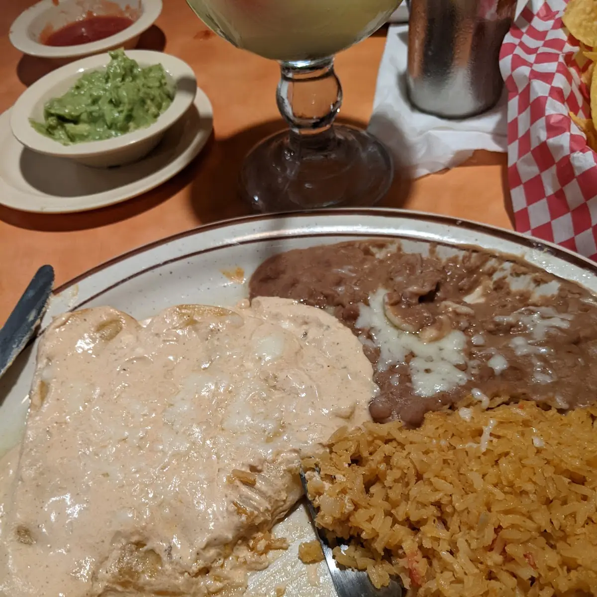 Cheese Enchiladas with Cheese Sauce Rice and Beans