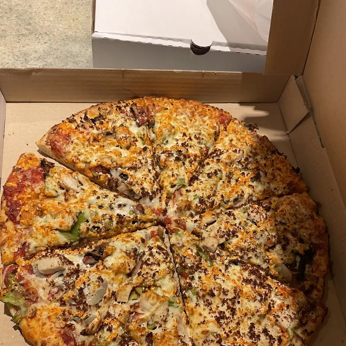 Extra Cheese, Uptown Pizza