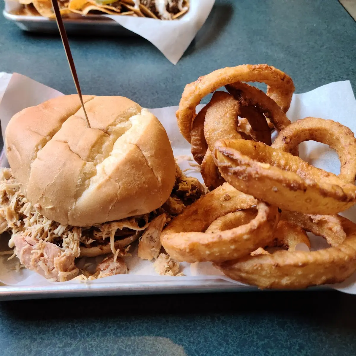 Smoked Pulled Chicken Sandwich with Onion Rings