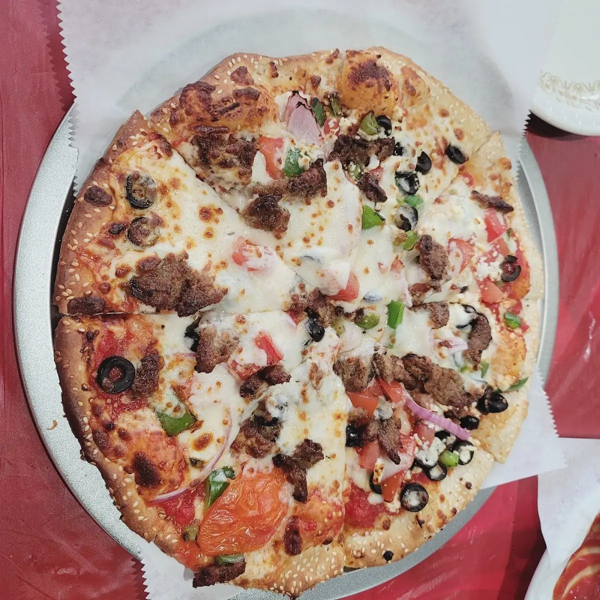 Greek Specialty Pizza or Calzone