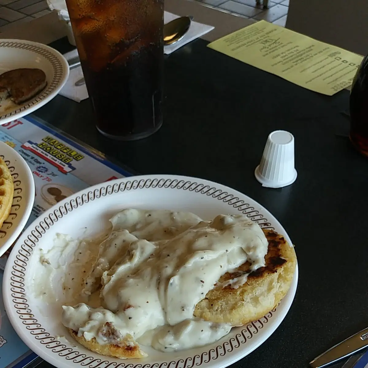 Two Biscuits & Gravy Two Eggs on the Side & Beverage