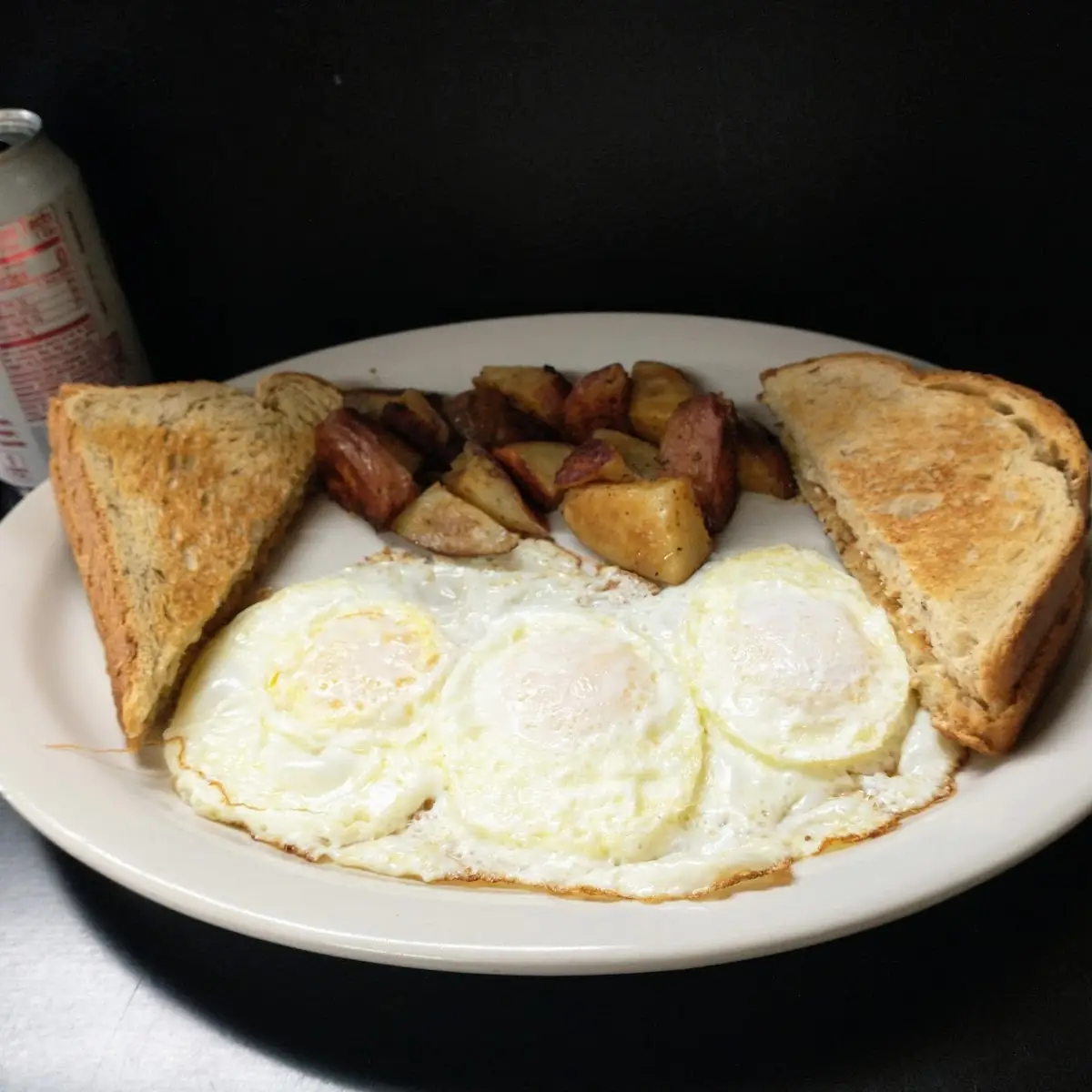 Eggs over Medium Home Fries Rye Toast