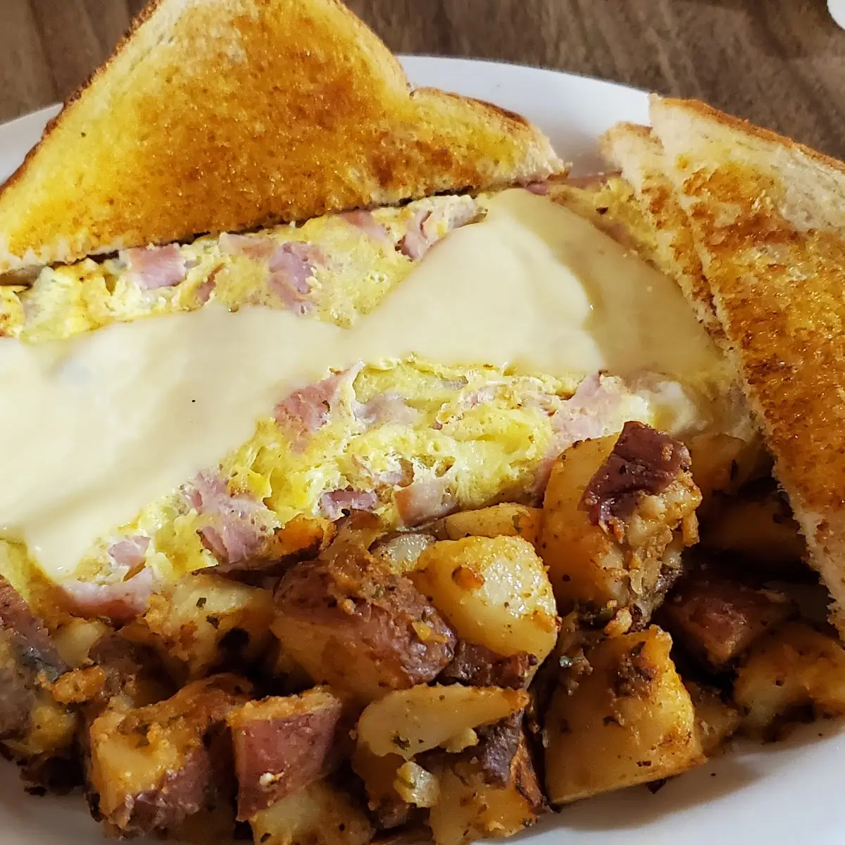 Pastrami or Corned Beef Eggs Swiss Cheese & Onion