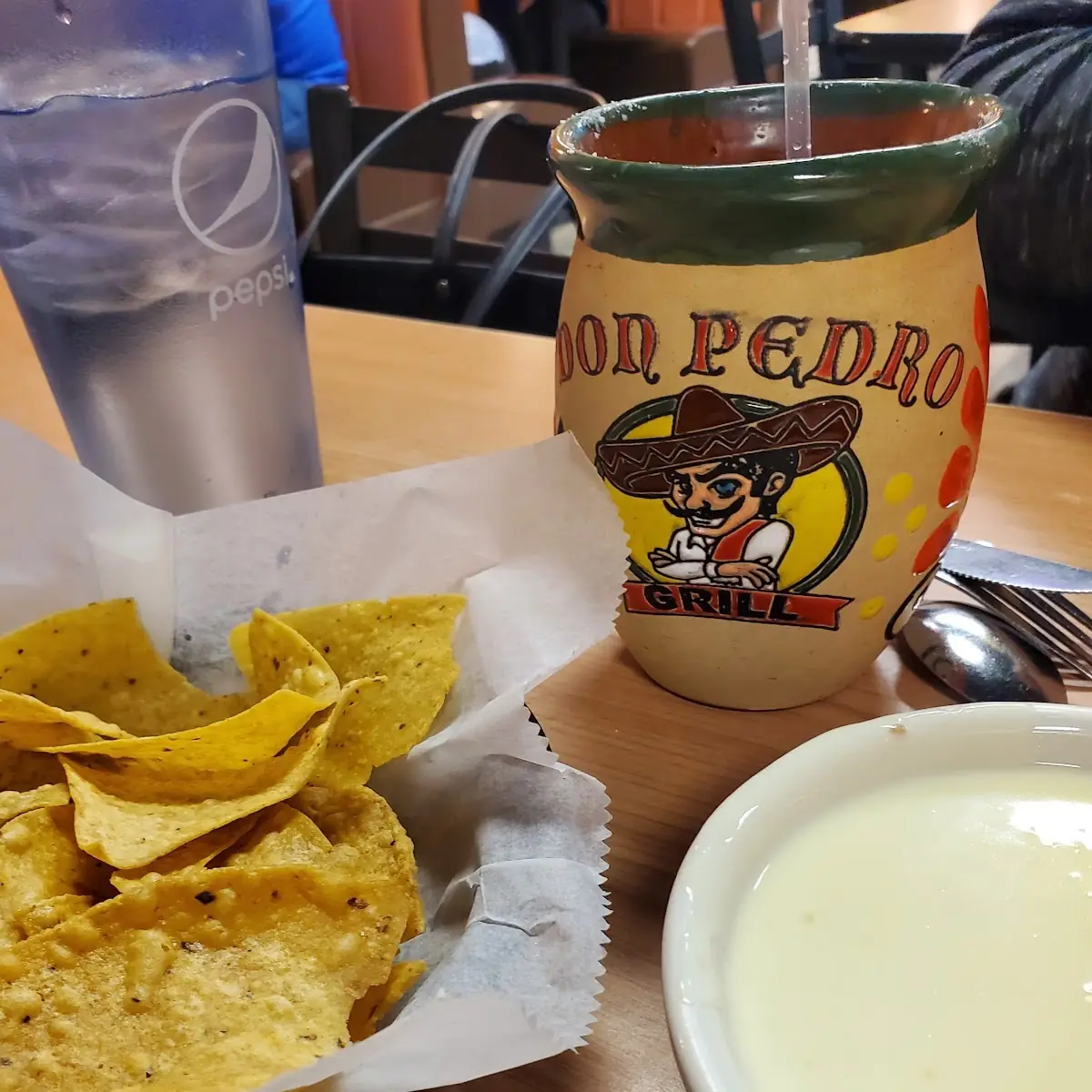 Yellow Corn Chips White Queso Dip and a Margarita
