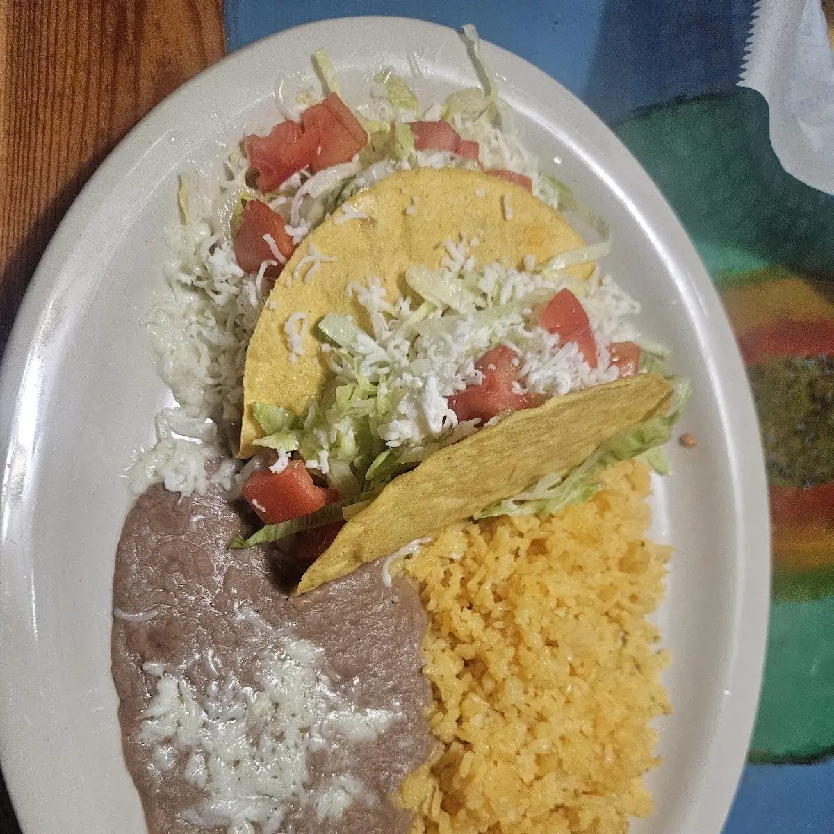 1 Guacamole Tostada 1 Beef Enchilada Combo