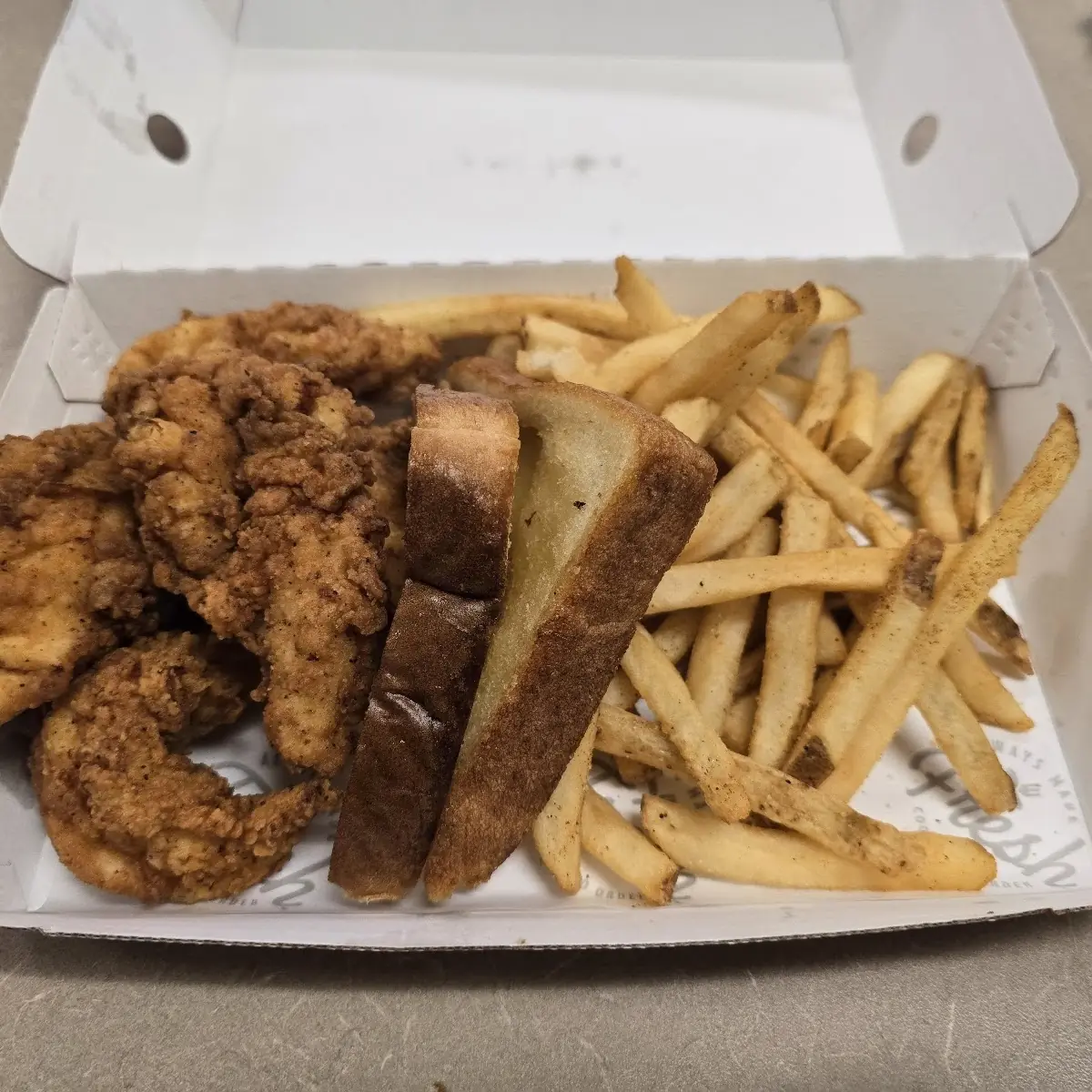 Chicken Strips Fries and Toast