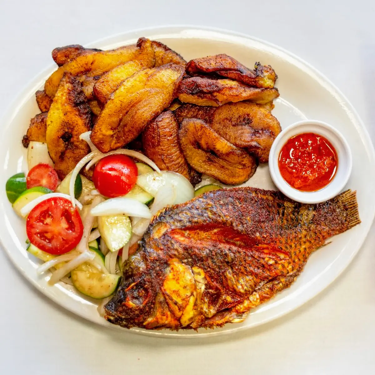 Attieke with Grilled or Fried Fish Chicken