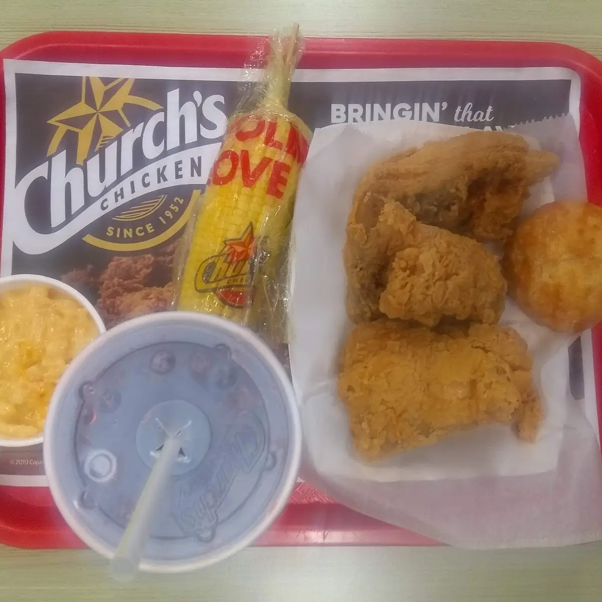 Fried Chicken Thighs Biscuit Corn Macaroni and Cheese & Soft Drinks