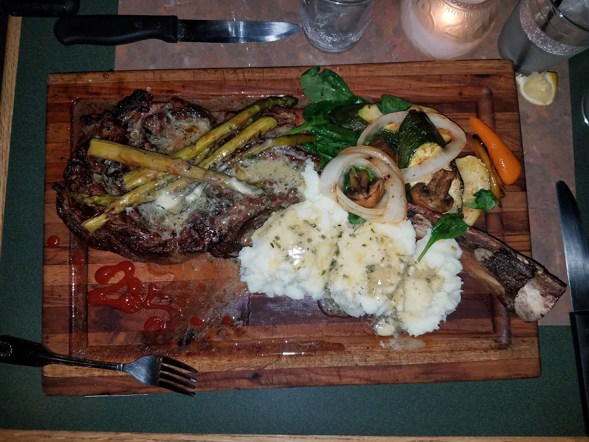 Tomahawk Steak with Mashed Potatoes and Grilled Vegetables