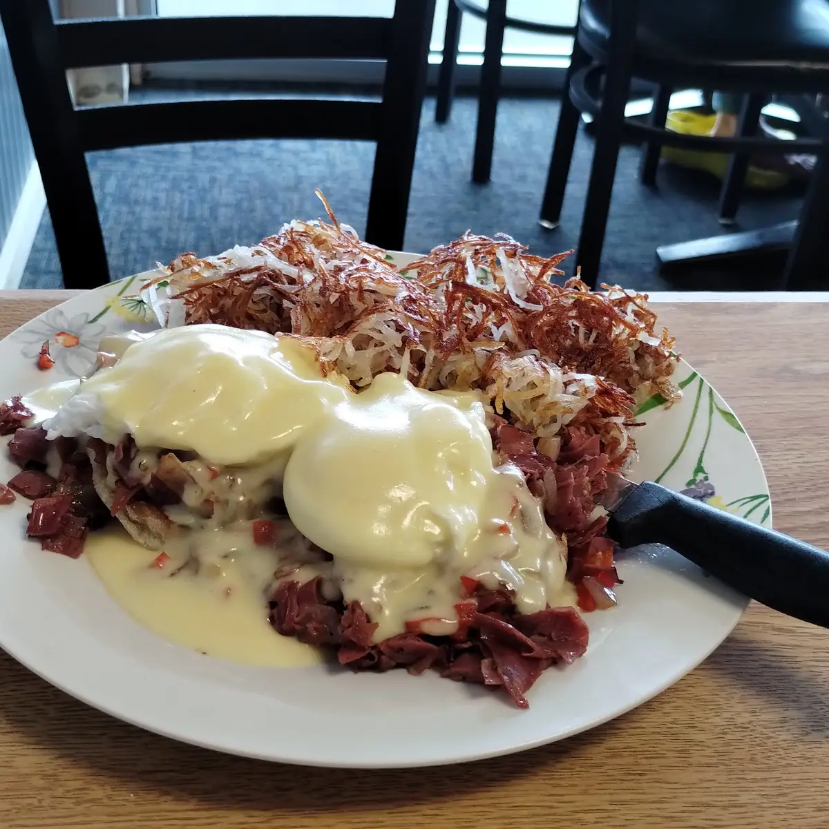 Biscuit and Gravy with Side of Potatoes and Two Eggs