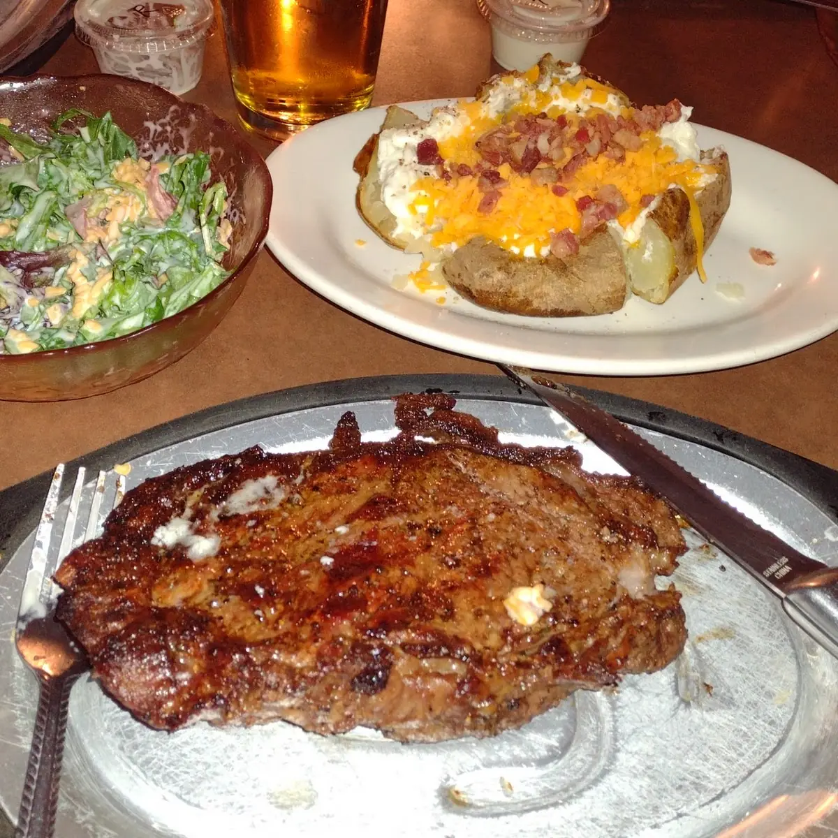 New York Steak with Cream Potatoes and Bacon
