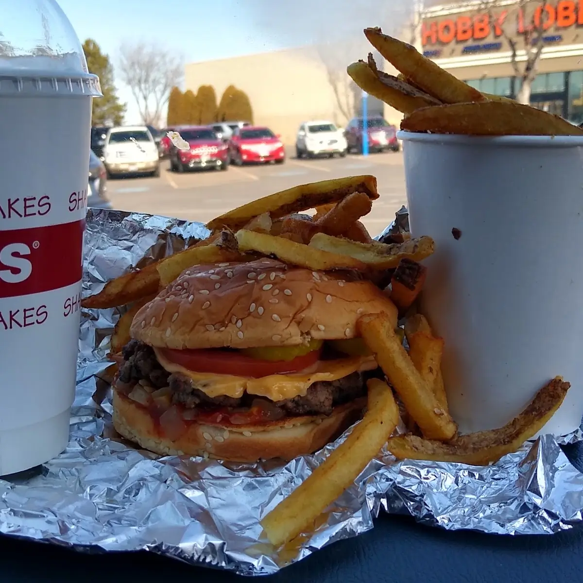 Mushroom Swiss Burger and Fries with Cheese