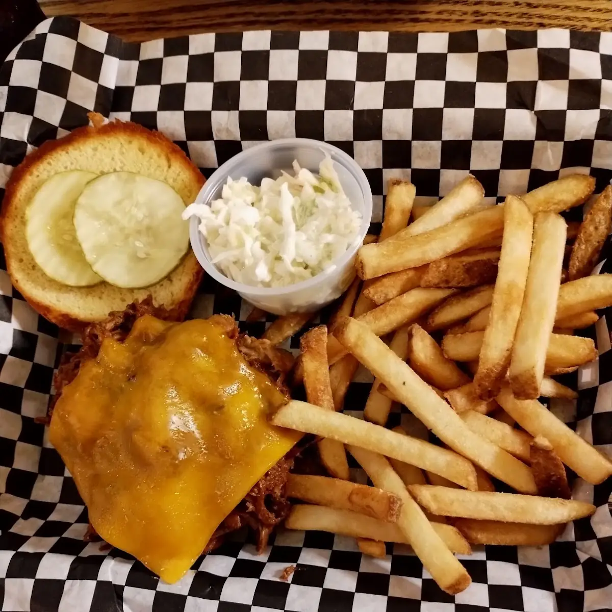 Pulled BBQ Pork Sandwich with Fries and Coleslaw