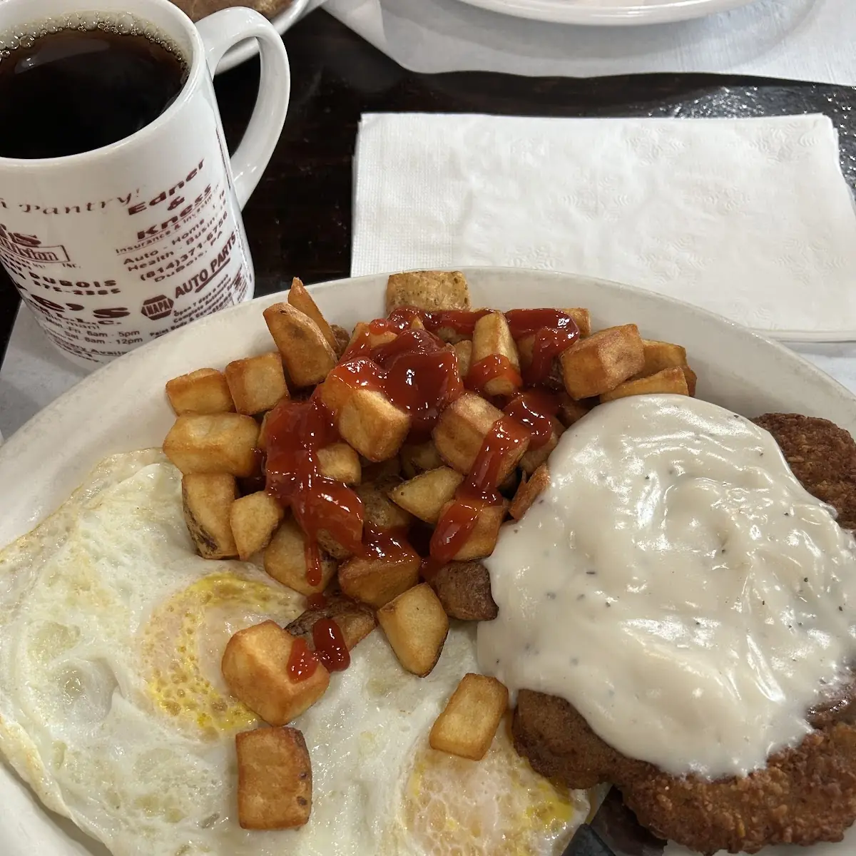 Two Eggs over Easy with Hashbrowns and Chicken Fried Steak with Gravy