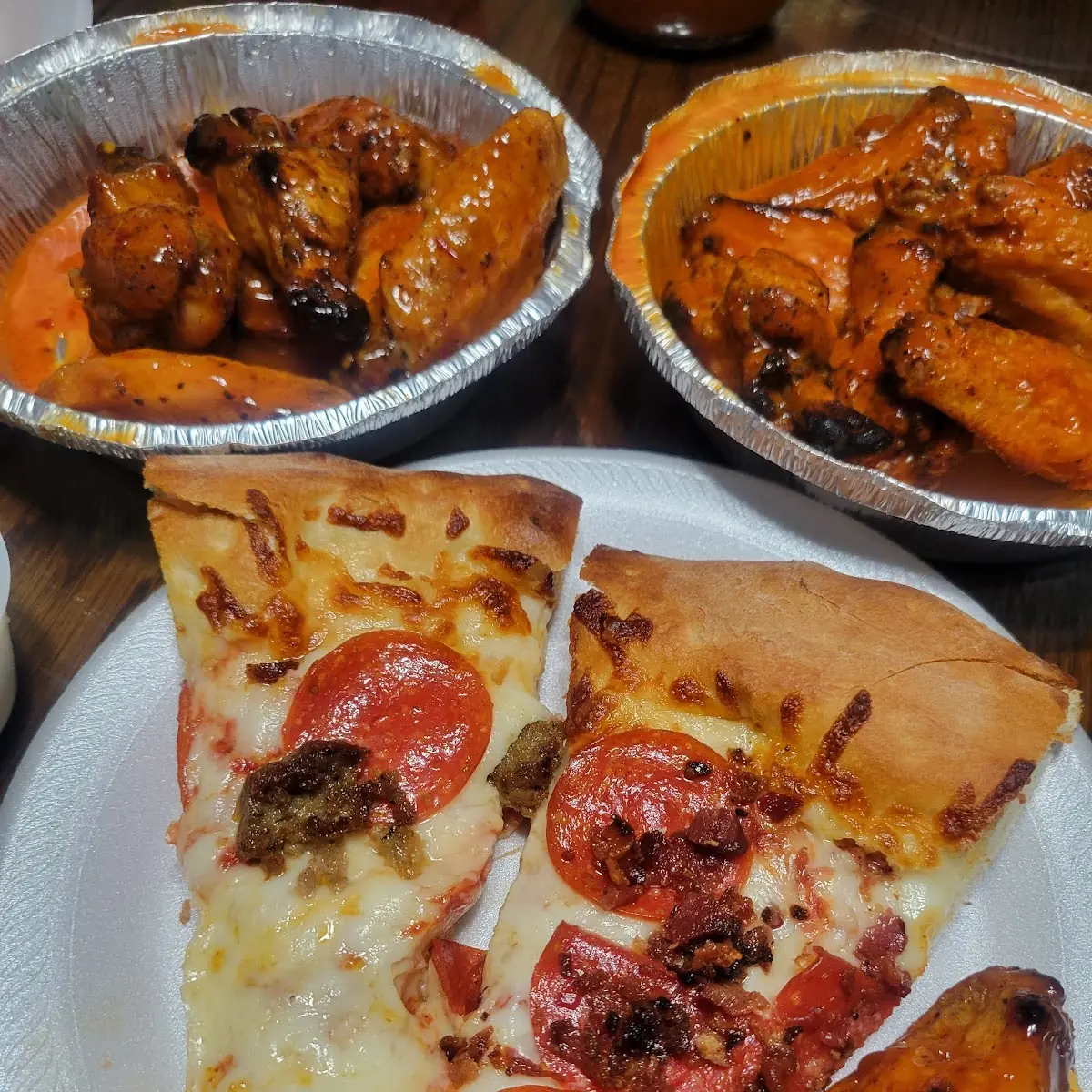 Medium Pepperoni Pizza or Boneless Wings 8pcs