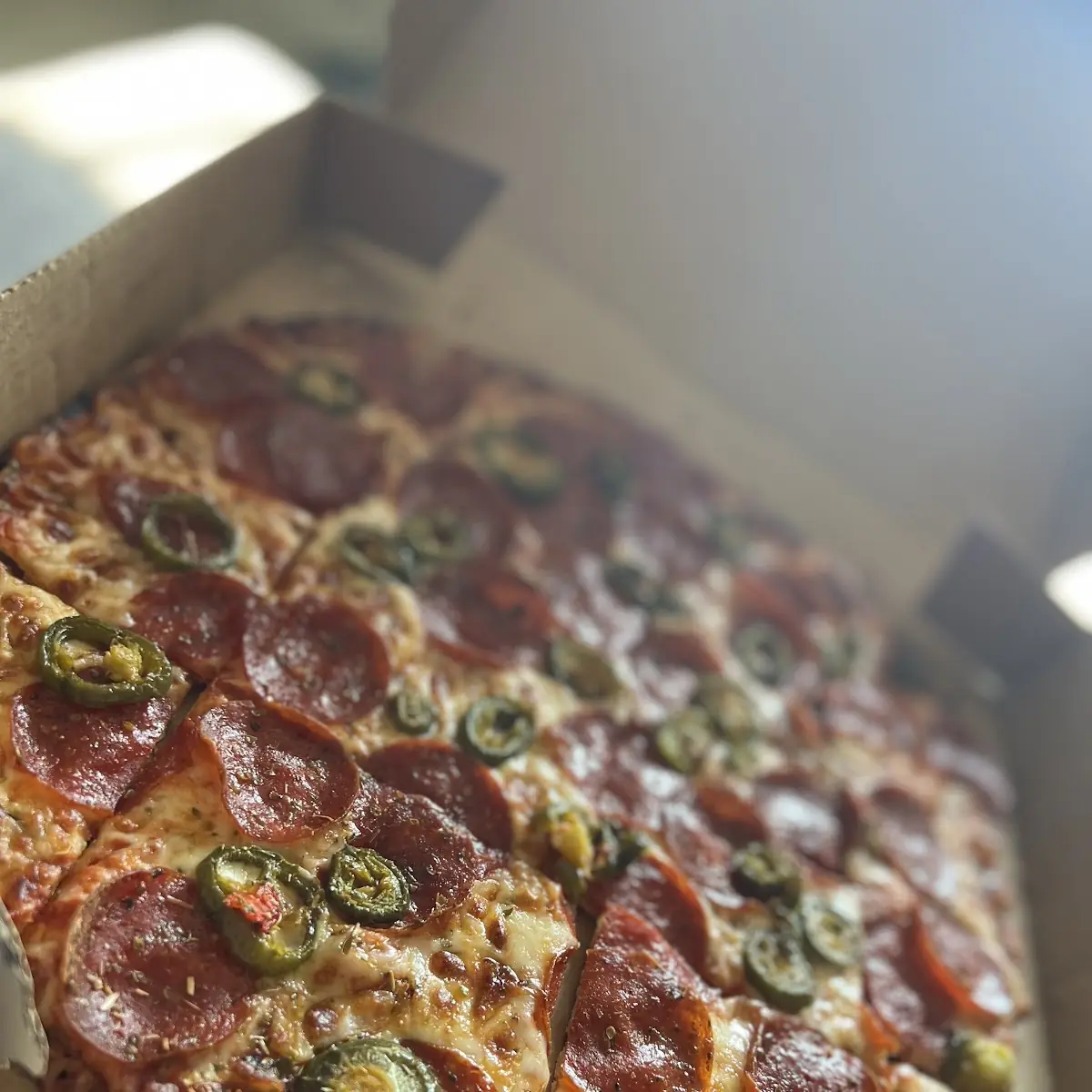 Pepperoni and Jalepeño Thin Crust Cheese Pizza