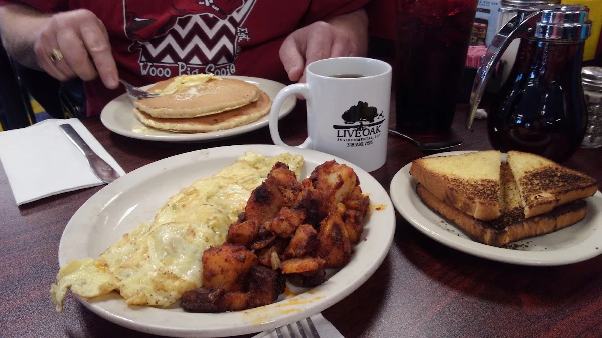 Three Meat Omelette with Hash Browns and Biscuits