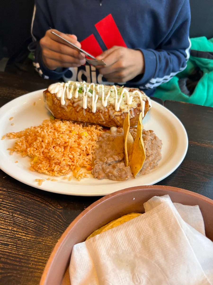 Chimichanga with Mexican Rice and Refried Beans on the Side