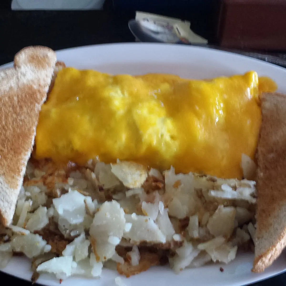 Scrambled Eggs with Cheese Home Fries & Toast