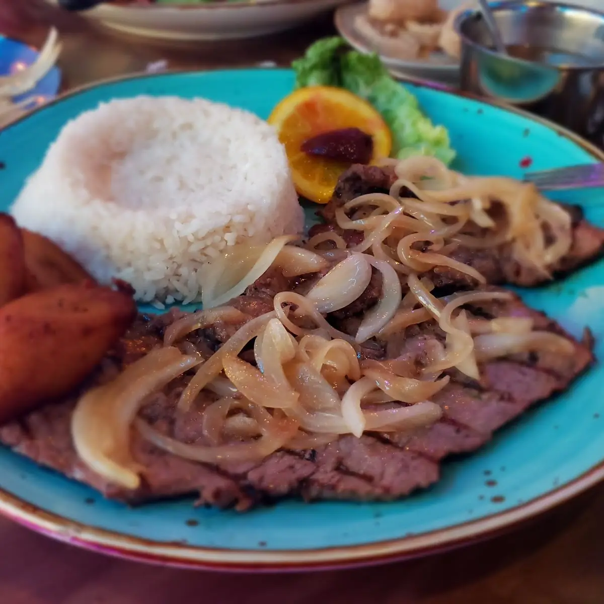 Bistec Encebollado