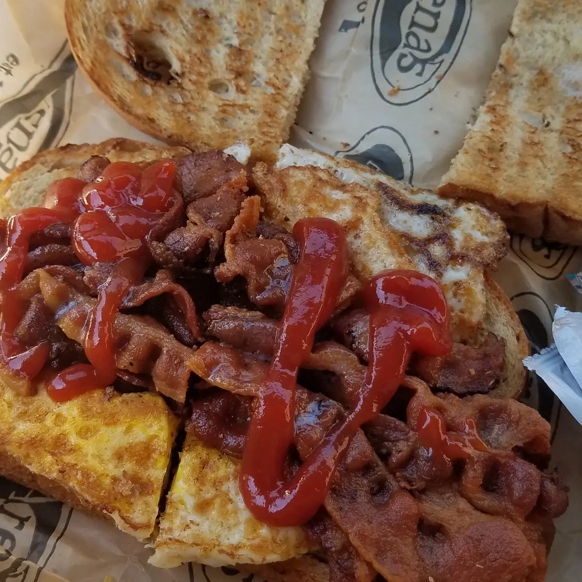 Bacon & Egg Sandwich on Rye Toast Ketchup