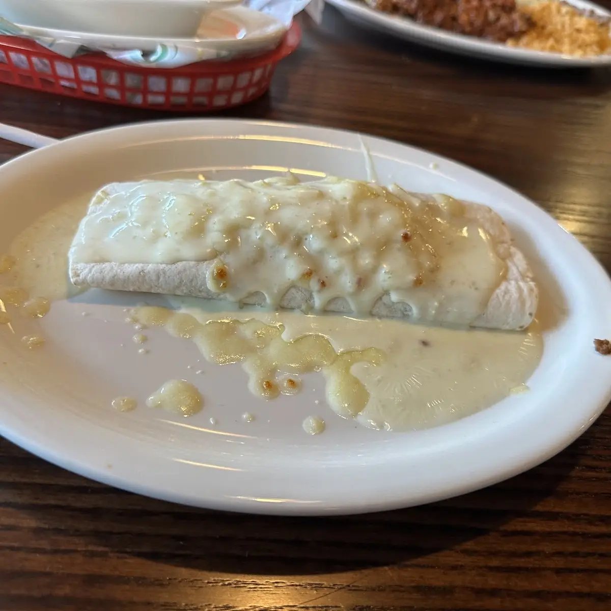 Beef and Bean Burrito with Cheese on Top