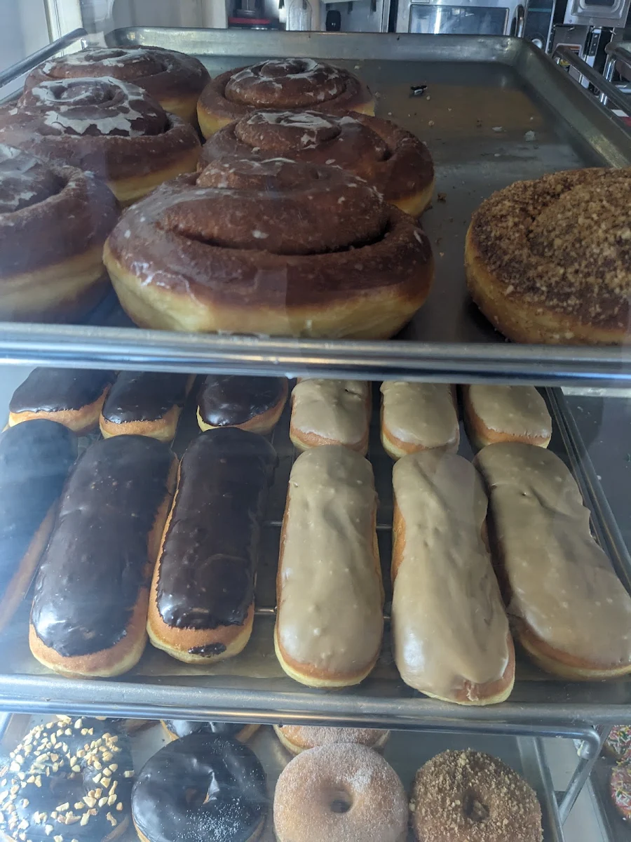 Maple and Chocolate Long John Donuts and Cinnamon Roll Donut