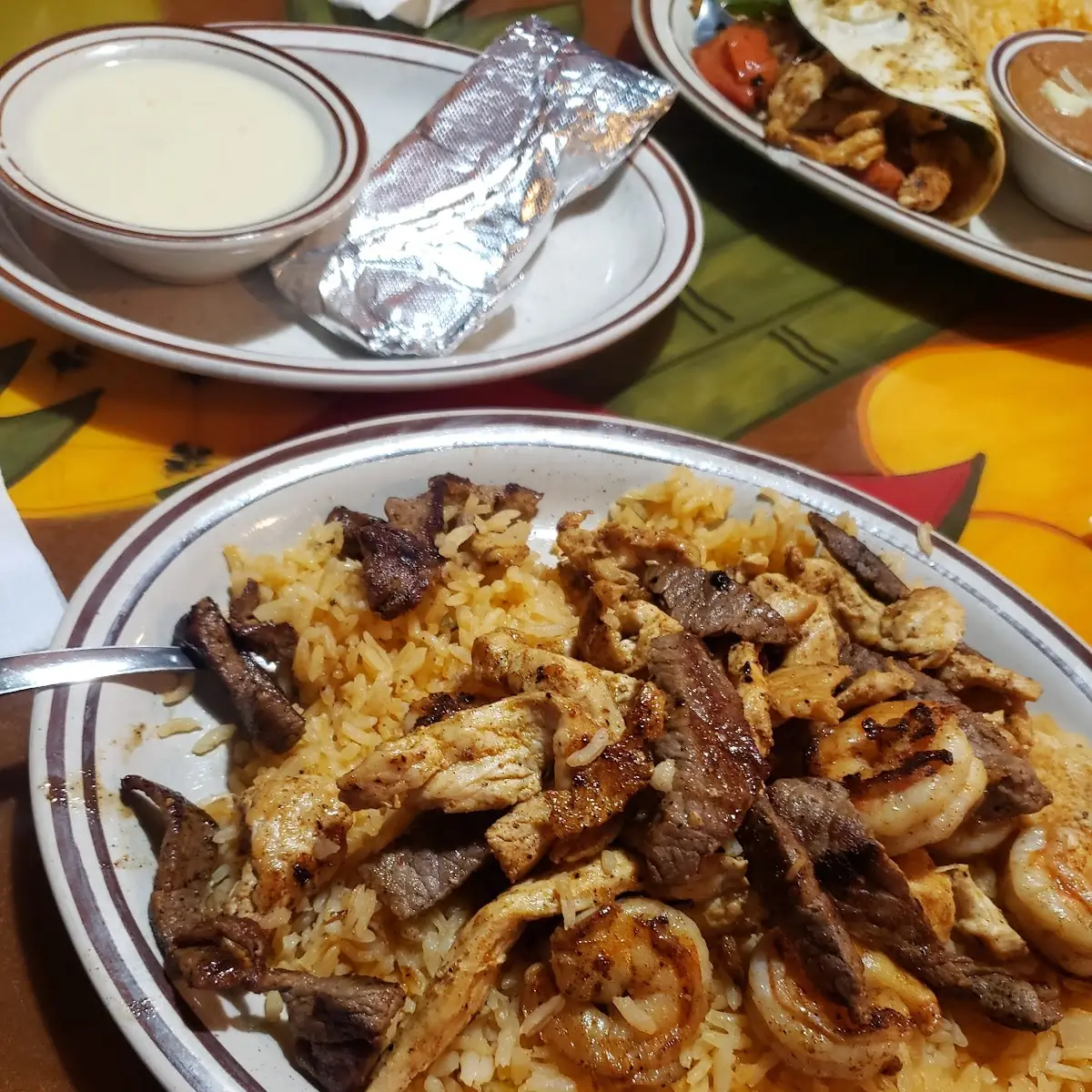 Pollo Ranchero with Steak and Shrimp