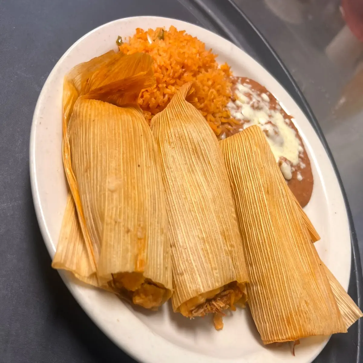 One Tamale with Rice & Beans