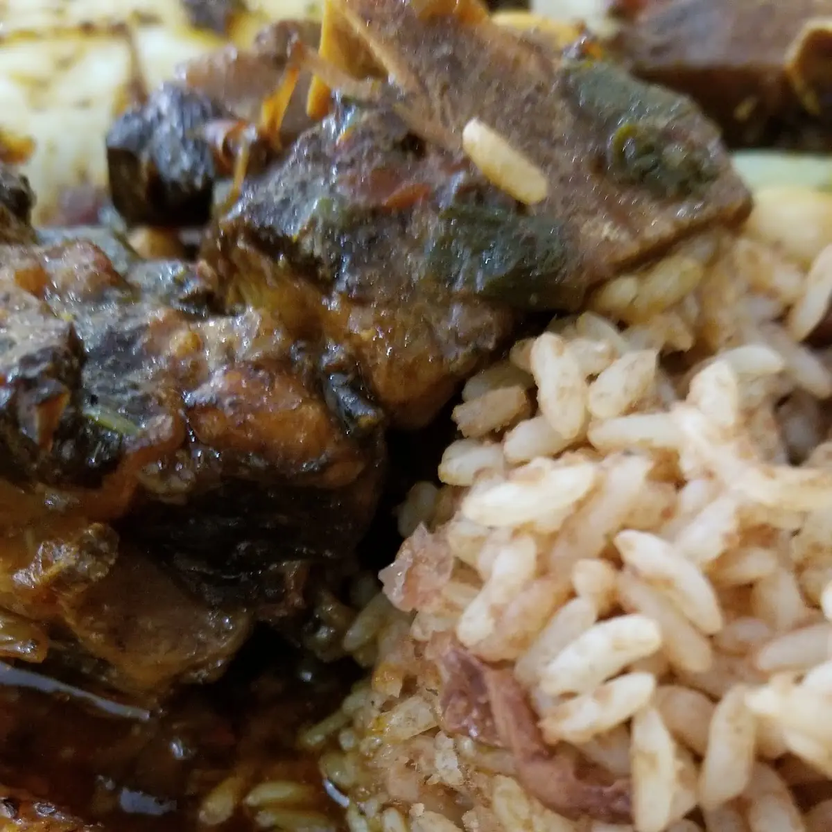 Ox Tail Plantains Rice and Beans