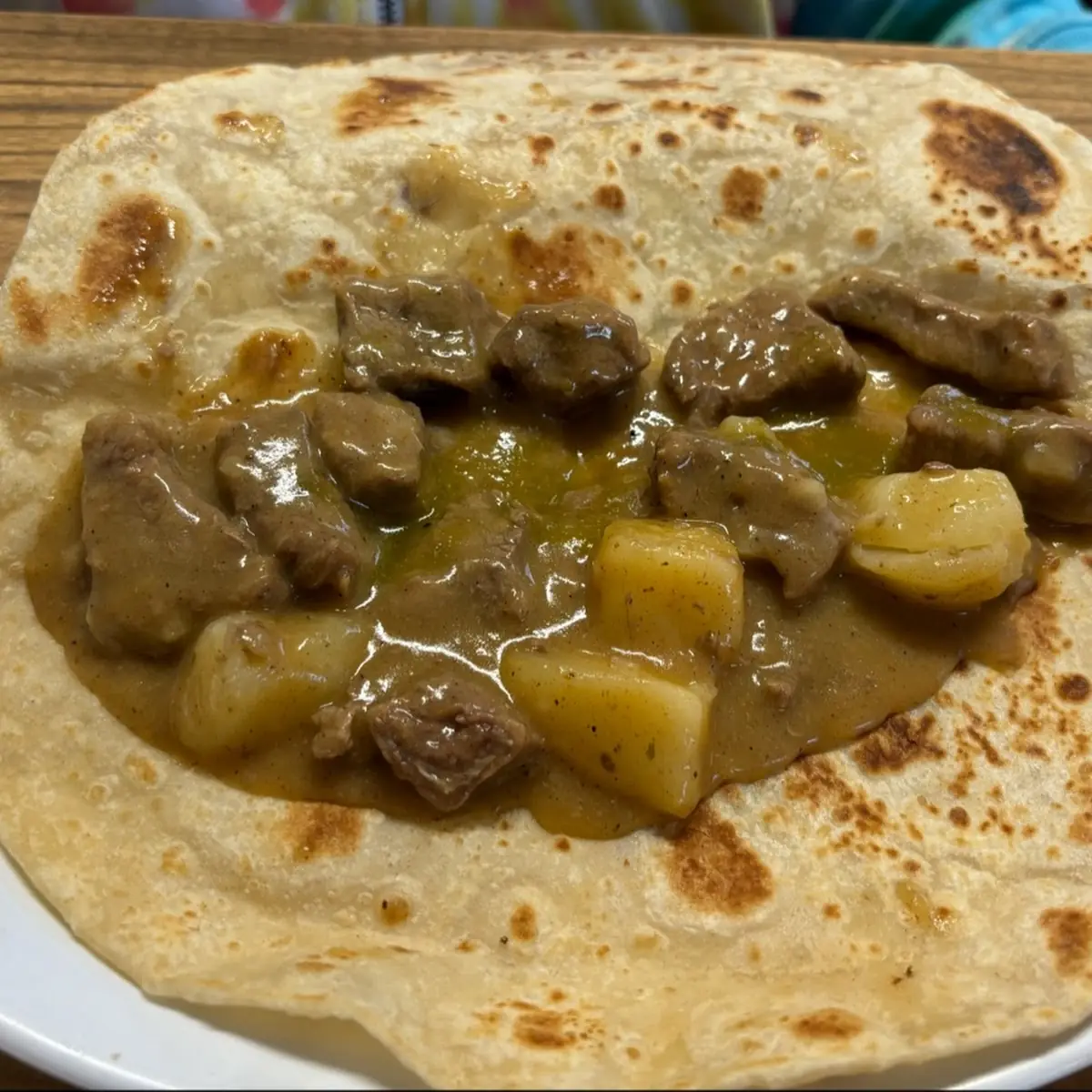 Taco De Harina with Carne Guisada