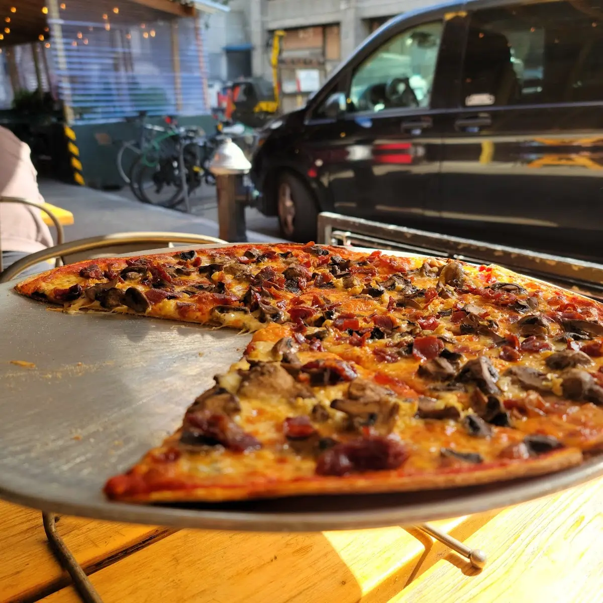 Thin Crust Pizza with Prosciutto E Funghi E Ajo