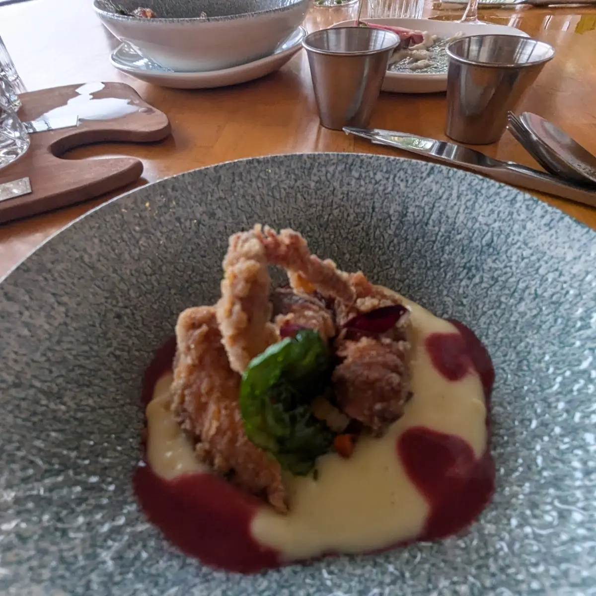 Tapioca Fried Octopus Charred Carrot Celery Olive Sofrito with Purple Kalamata Olive Puree